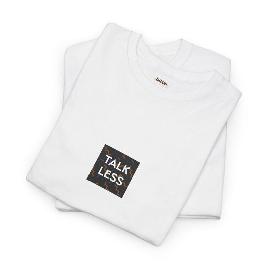 White t-shirt with 'Talk Less' patch on a white background